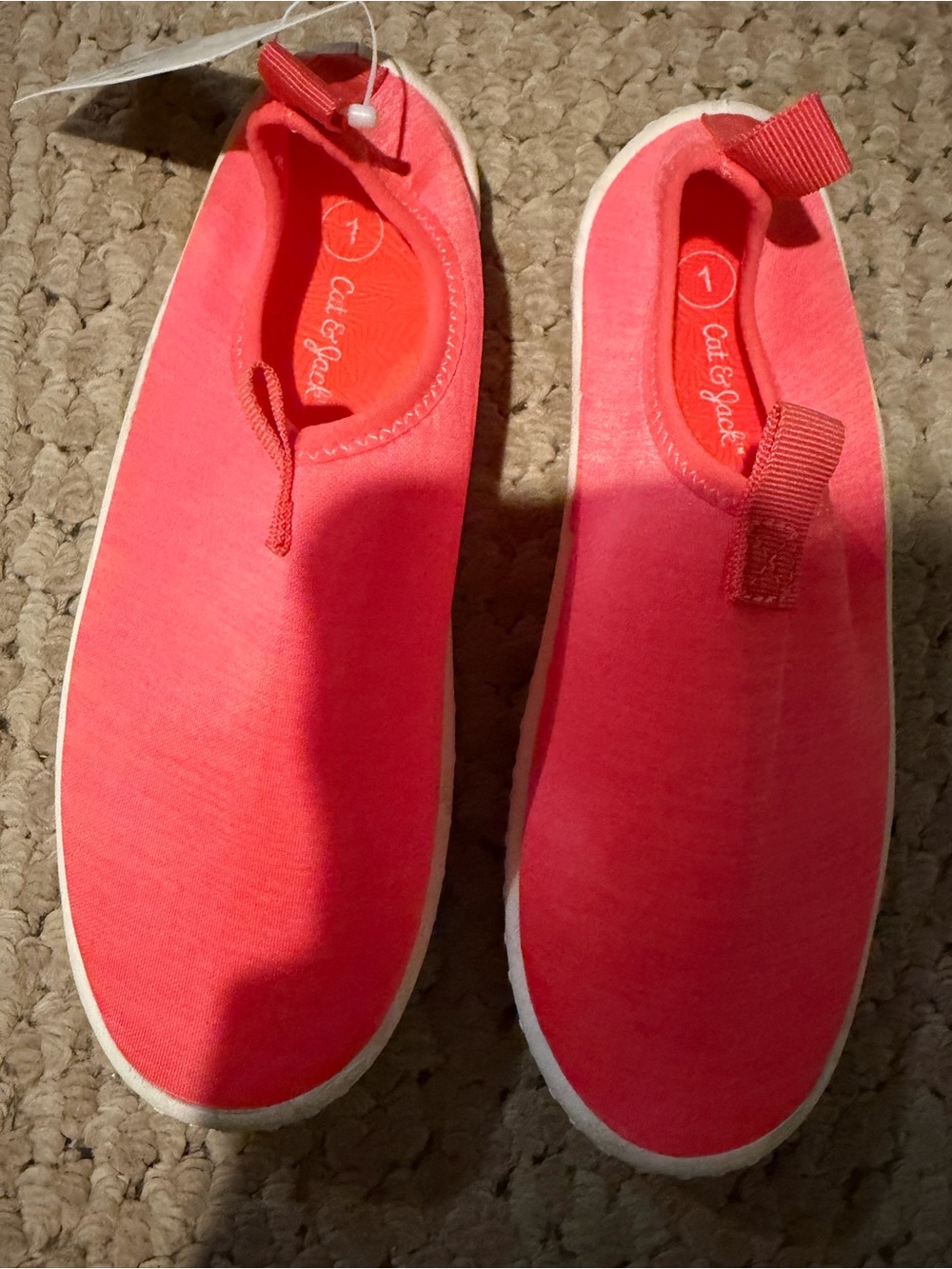 Brand new These are Cat & Jack brand neon coral slip-on water shoes